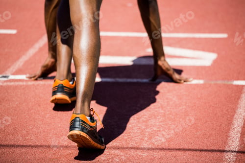 Preview: Athlete On A Starting Line About To Run On Running Track