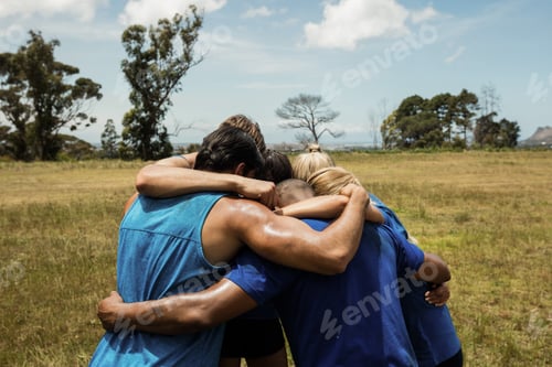 Preview: Fit People Standing Together And Forming A Hurdle In Bootcamp