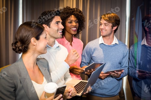 Preview: Business People Looking At A Graph In The Conference Room At Office