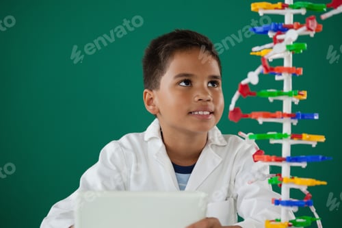 Preview: Smiling Schoolboy Experimenting Molecule Model In Laboratory At School