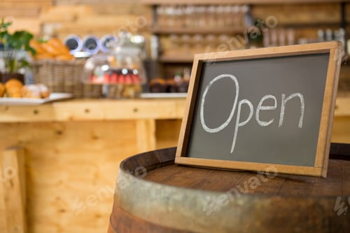 Preview: Close-Up Of Open Signboard In Coffee Shop