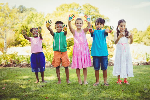 Preview: Portrait Of Cute Children With Make Up Having Coloured Hands In A Park