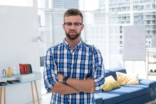 Preview: Portrait Of Male Executive Standing With Arms Crossed In Office