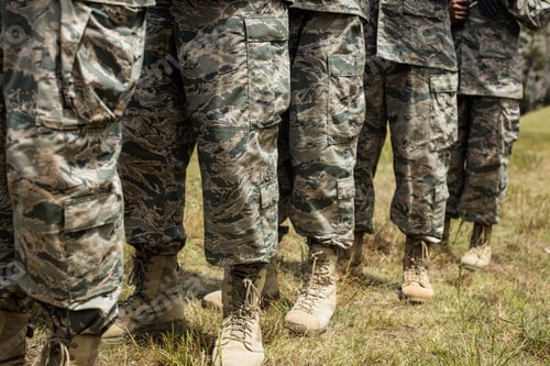 Preview: Low-Section Of Military Soldiers Standing In Line At Boot Camp