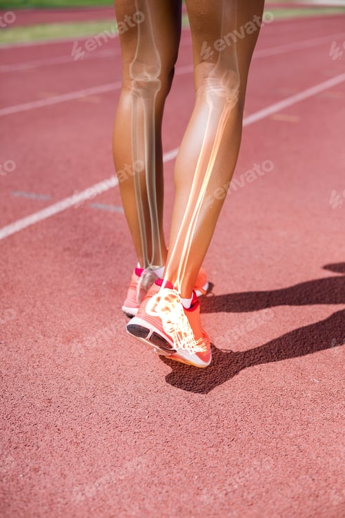 Preview: Low Section Of Athlete Walking On Track During Sunny Day