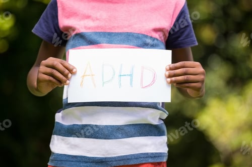 Preview: Boy Showing A Poster With Adhd In The Park