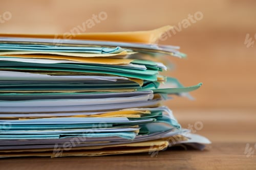 Preview: Close-Up Of Stacked Files On Table