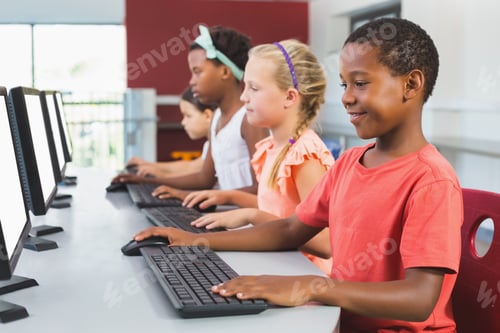 Preview: School Kids Using Computer In Classroom At School