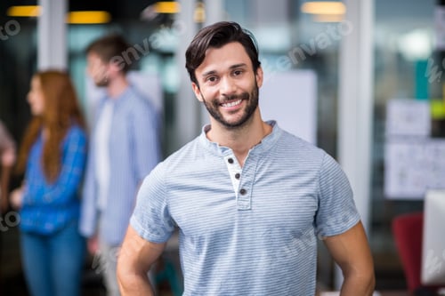 Preview: Portrait Of Smiling Male Executive In Office
