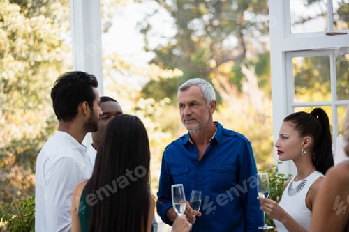 Preview: Friends Talking To Each Other While Having Drinks At Bar