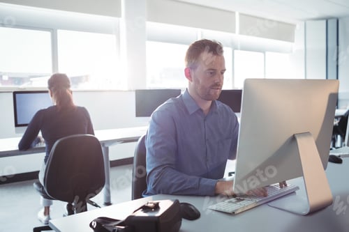 Preview: Mature Students Using Computer In The Computer Room At College