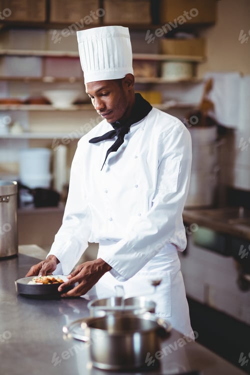 Preview: Head Chef Presenting A Salad In Commercial Kitchen