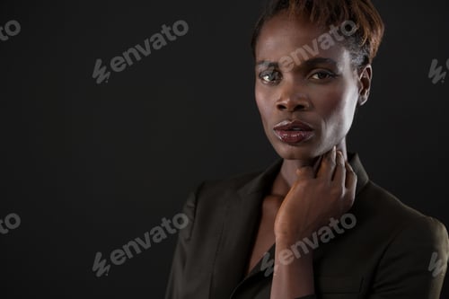 Preview: Portrait Of Androgynous Woman Posing With Hand On His Neck