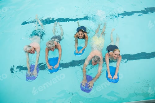 Preview: High Angle View Of Senior Swimmers Swimming In Pool