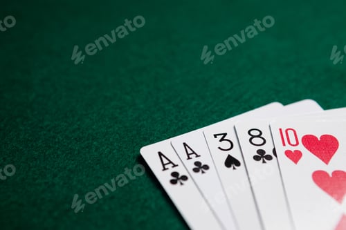 Preview: Playing Cards Arranged On Poker Table In Casino