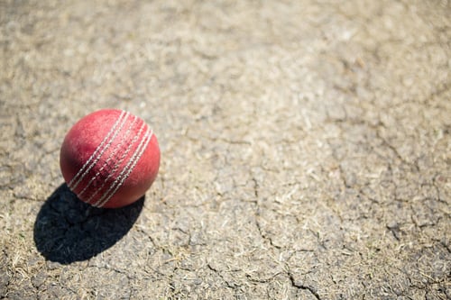 Preview: High Angle View Of Cricket Ball On Pitch During Sunny Day