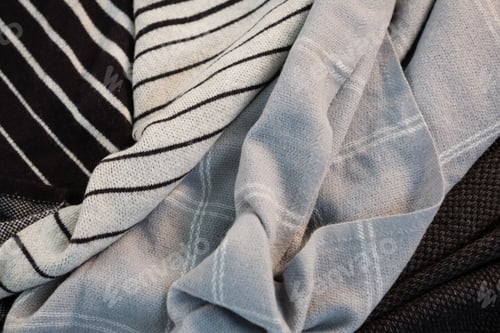 Preview: Fabric Swatches with Varied Patterns and Textures