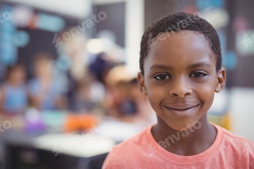 Preview: Portrait Of Cute Schoolboy In Classroom At School