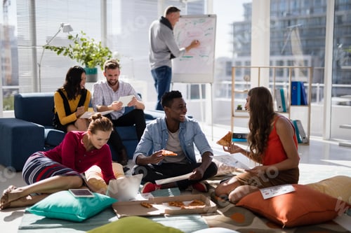 Preview: Executives Discussing Over Document In Office