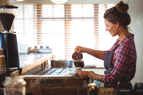 Preview: Waitress Preparing A Coffee In A Cafe