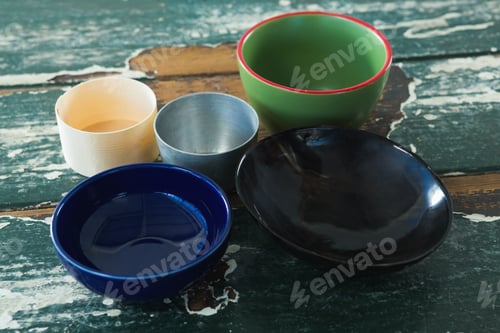 Preview: Close-Up Of Various Empty Bowl On Wooden Table