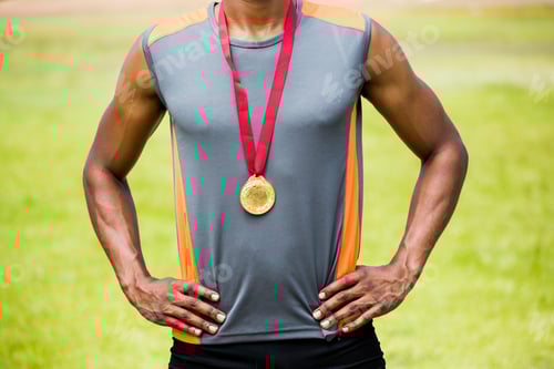 Preview: Mid Section Of Athlete Posing With Gold Medal Around His Neck