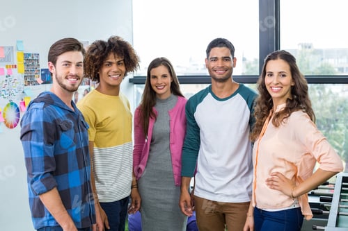 Preview: Portrait Of Happy Graphic Designers Standing Together In Office