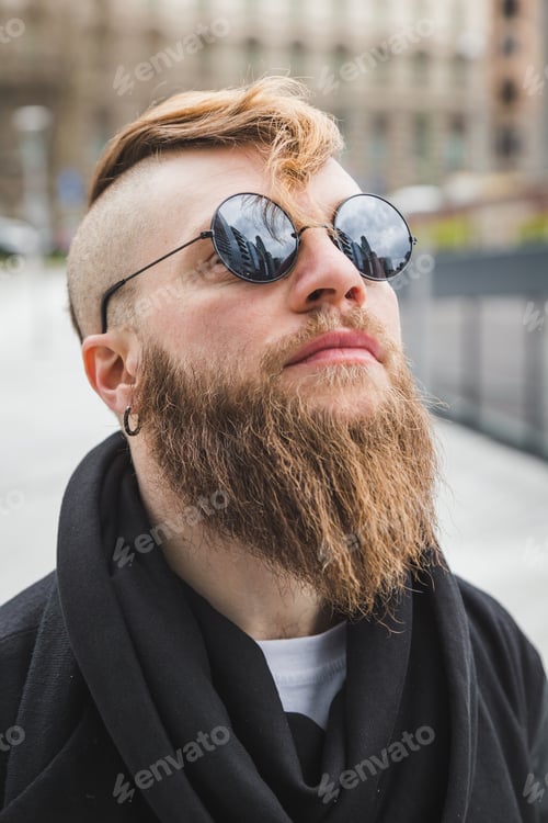 Preview: Stylish Young Bearded Man Posing In An Urban Context