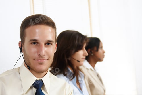 Preview: Portrait Of An Attractive Young Caucasian Man Telemarketer.