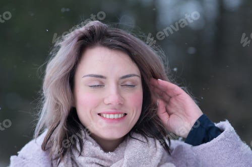 Preview: Portrait Of A Young Beautiful Girl Outdoors In The Winter In The Park