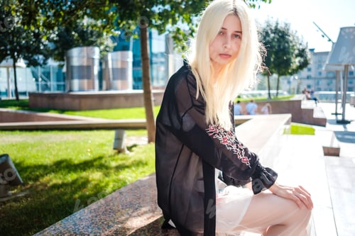 Preview: A Girl With Blond Hair Is Walking Near The Business Center In Moscow. Japanese Fashion.