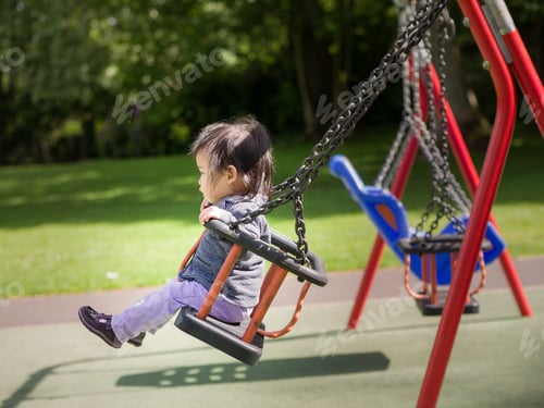Preview: Baby Girl Playing In The Playground