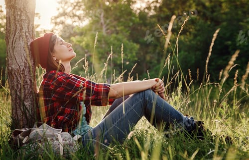 Preview: Young Hipster Girl Enjoy Sunset At Forest. Travel Woman With Backpack. Enjoying Nature Sunset