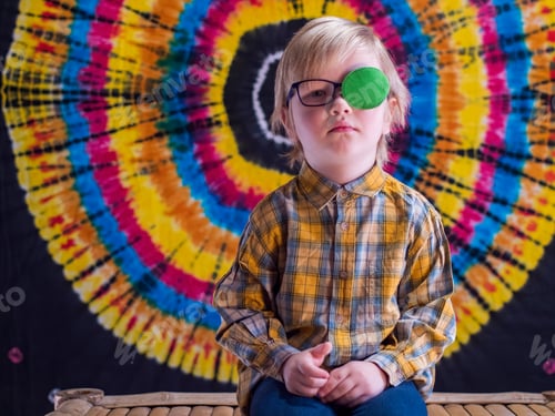 Preview: Portrait Of Funny Child In New Glasses With Green Patch For Correcting Squint Ortopad Boys Eye