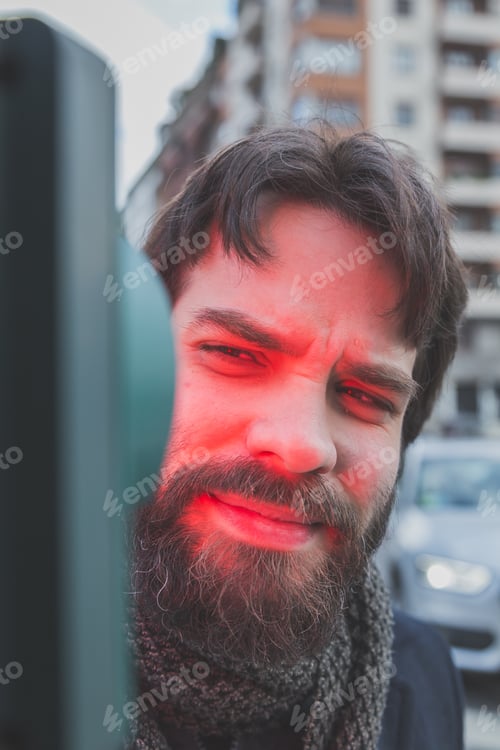 Preview: Young Handsome Bearded Man With Coat Posing In The City Streets