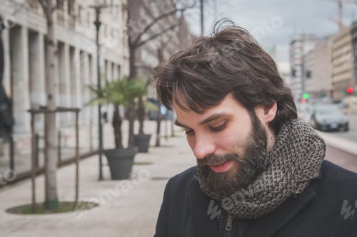 Preview: Young Handsome Bearded Man With Coat Posing In The City Streets