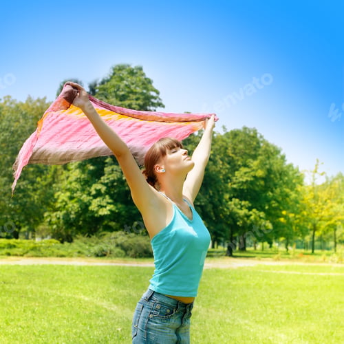 Preview: Young Woman With Arms Raised Enjoying Nature.