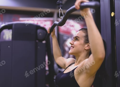 Preview: Young Woman Workout In Gym. Healthy Lifestyle