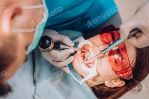 Preview: Doctor Performs The Procedure For Cleaning Teeth