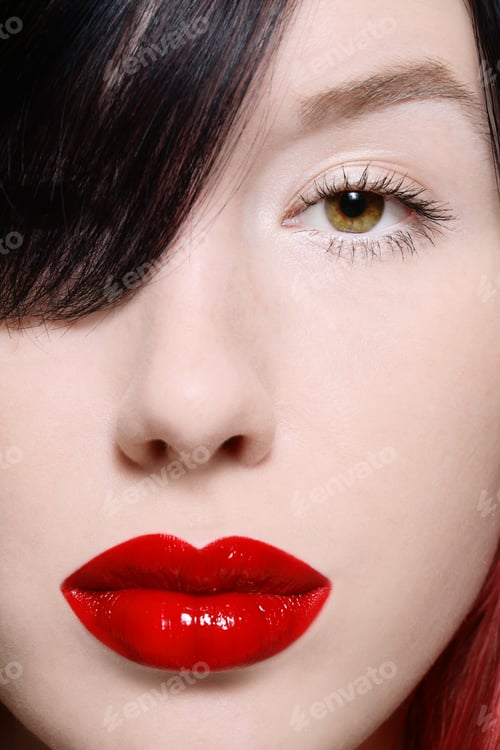 Preview: Close-Up Shot Of Beautiful Woman Face With Full Red Lips