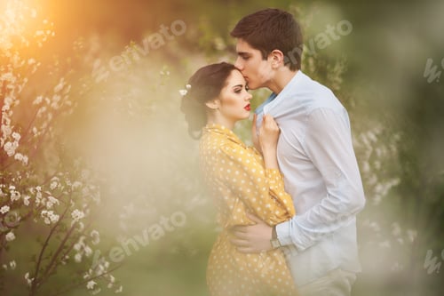 Preview: Beautiful Couple In Love At Sunset In The Garden Of Flowering