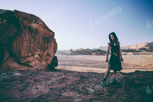 Preview: Beautiful Young Woman In Timna, Desert In Israel. Rocks In Sunset Time. Mystic Concept