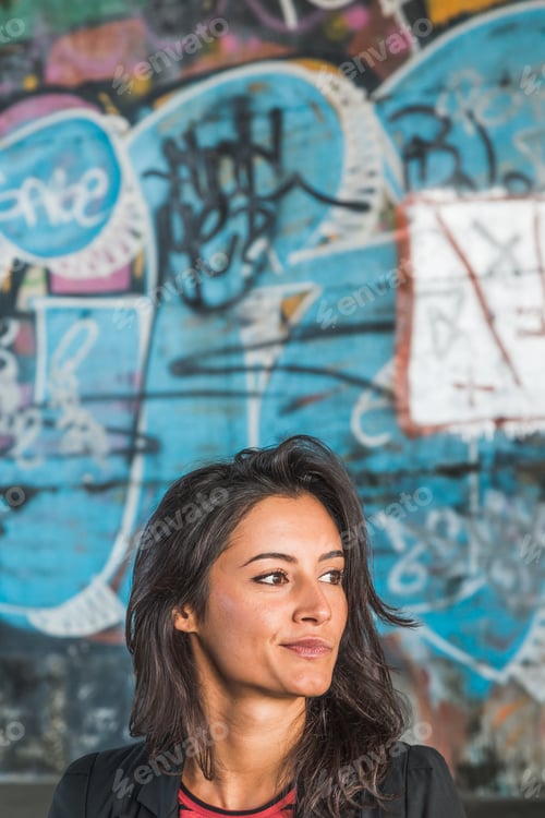 Preview: Beautiful Young Brunette With Long Hair Posing In An Urban Context