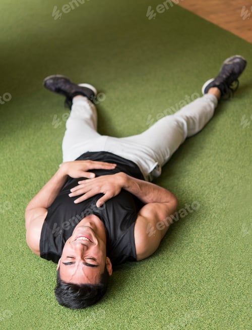 Preview: Sport. Young Athletic Man Resting After Doing Push-Ups. Muscular And Strong Guy Resting After