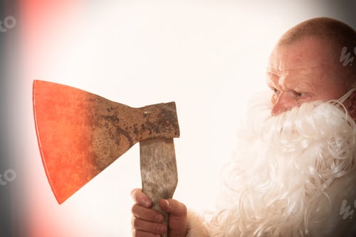 Preview: Bad Santa Claus With An Ax. The Concept Of Fun And Unexpected Advertising. Toned.