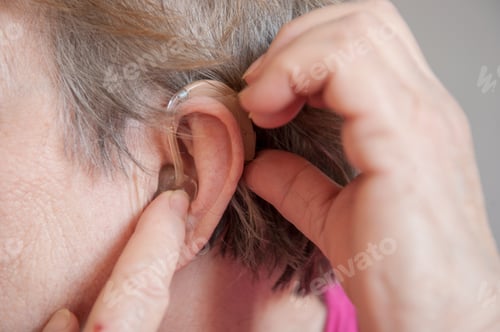 Preview: Elderly Retired Woman With Hearing Impairment Received Hearing Aid Of Latest Modification In Center