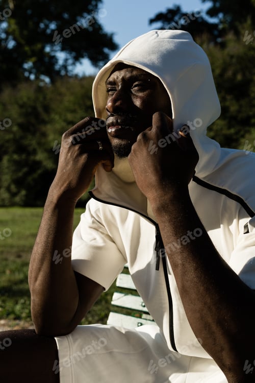 Preview: Portrait Of An Athletic Black Man Posing In A City Park. Concept Of Healthy Lifestyle.