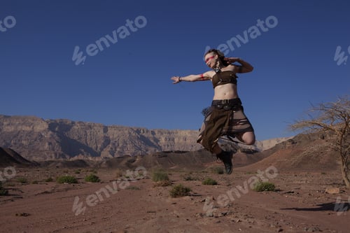 Preview: Woman Jumping In Desert On Timna, Israel