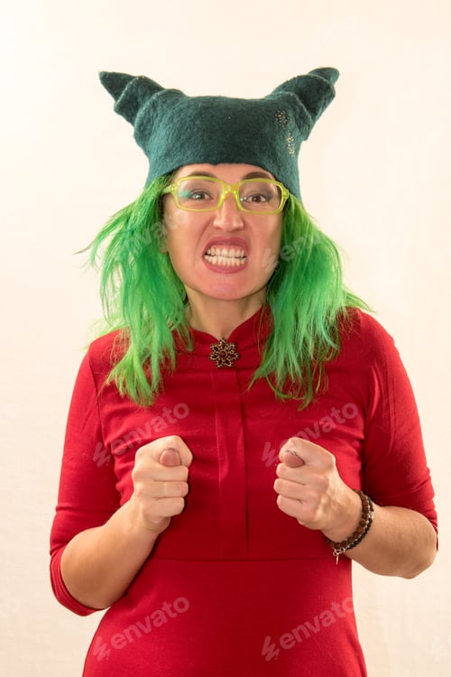 Preview: A Crazy Caucasian Girl Trying On Various Hats For The Christmas Fun Carnival. The Concept Of