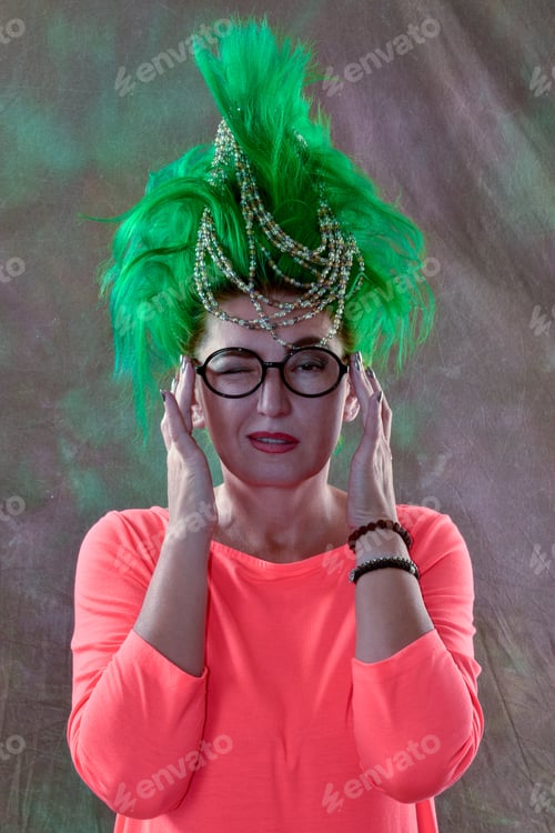 Preview: Caucasian Girl In Green Dress And With Green Hair Is Preparing For Holidays. Suit Of The Teacher Of